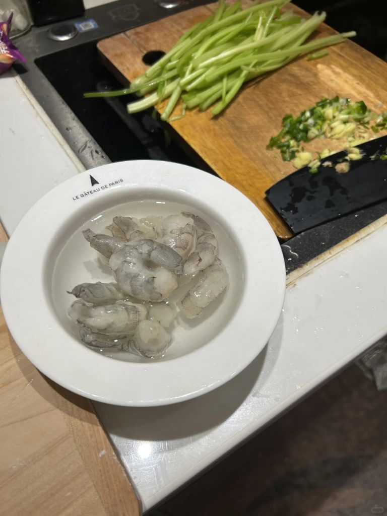 prepare shrimp, celery, and chopped scallions